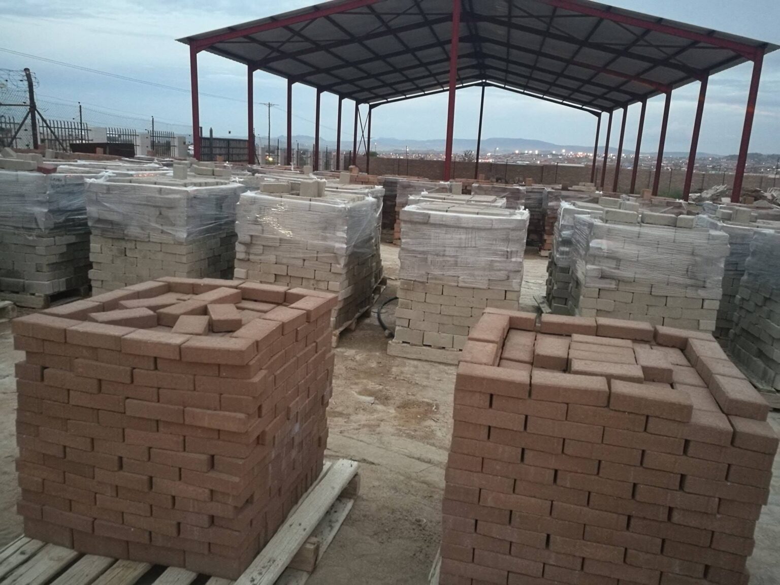 Large stock of concrete bricks and blocks in warehouse